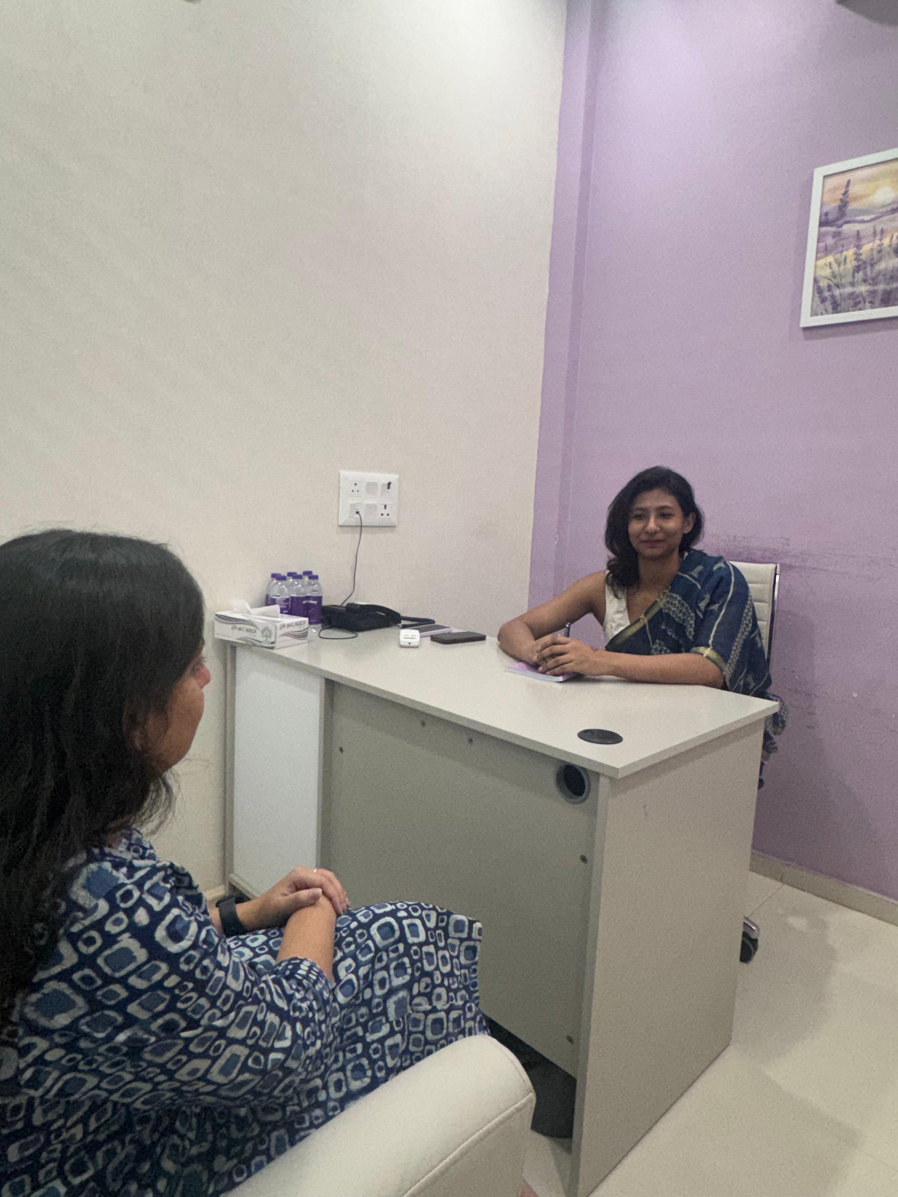 A one-on-one counseling conversation in the Renaissance consultation room.